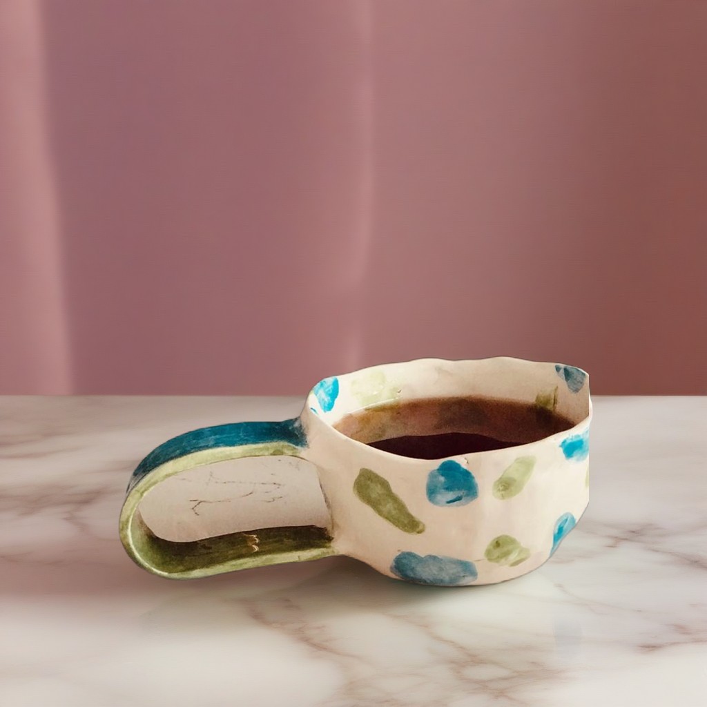 Same mug placed in an AI-generated marble lifestyle scene by Product Studio
